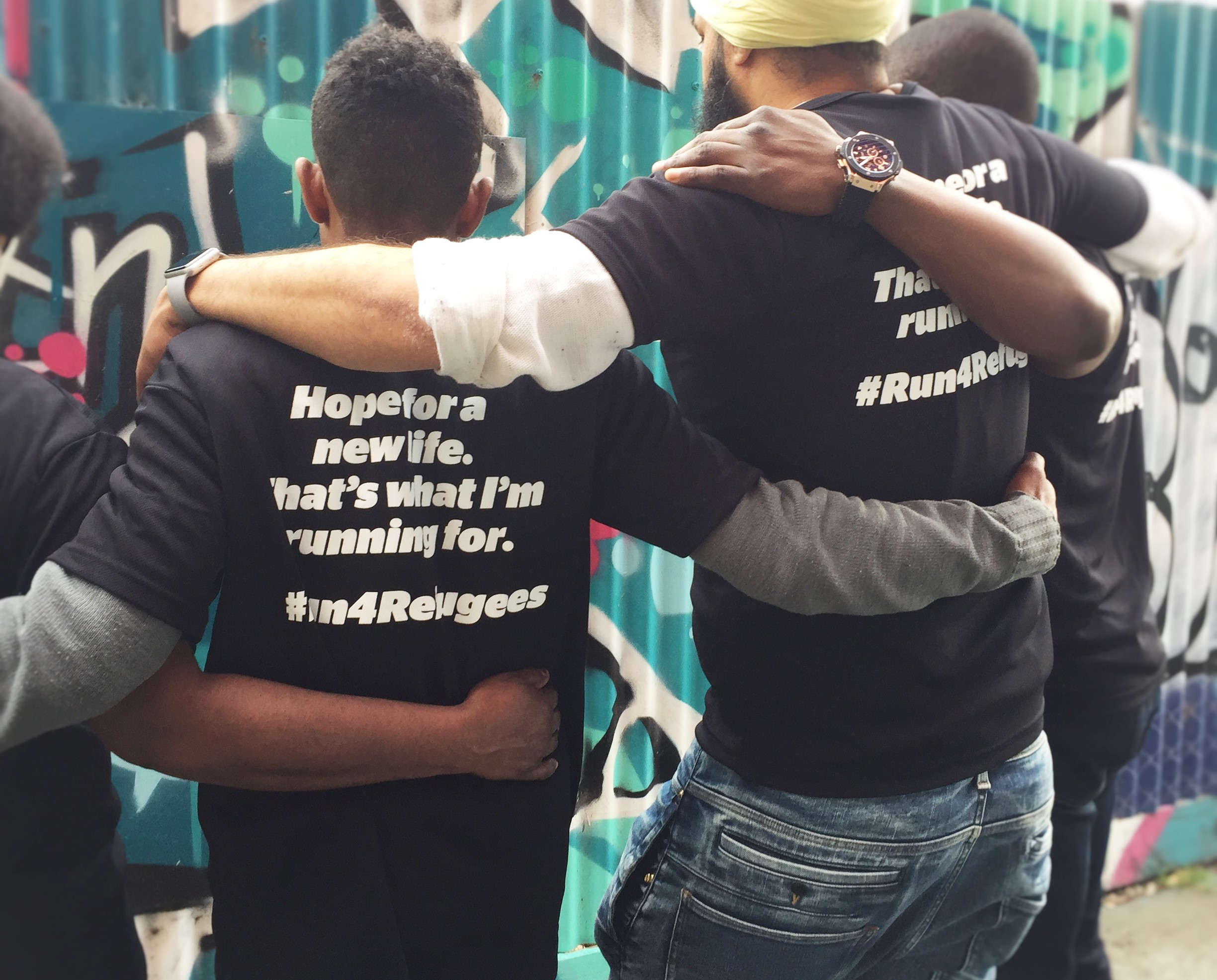 Team of people seeking asylum participating in Run 4 Refugees